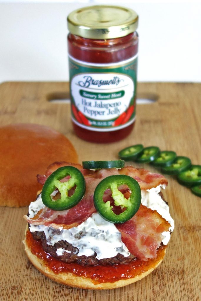 Jalapeno Burger with Cream Cheese, Bacon, and Jalapeno Jelly. This burger melts in your mouth with a kick of spice!