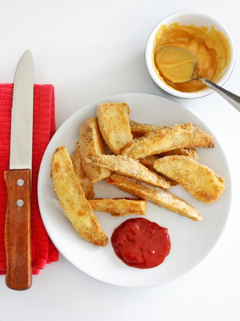 Oven Baked Potato Wedges are awesome if you want fresh homemade fries without the mess of frying. Hot, fluffy, and delicious with any meal.