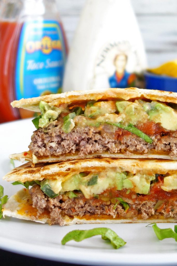 The quesadilla burger - topped with avocados, jalapenos, and cheese